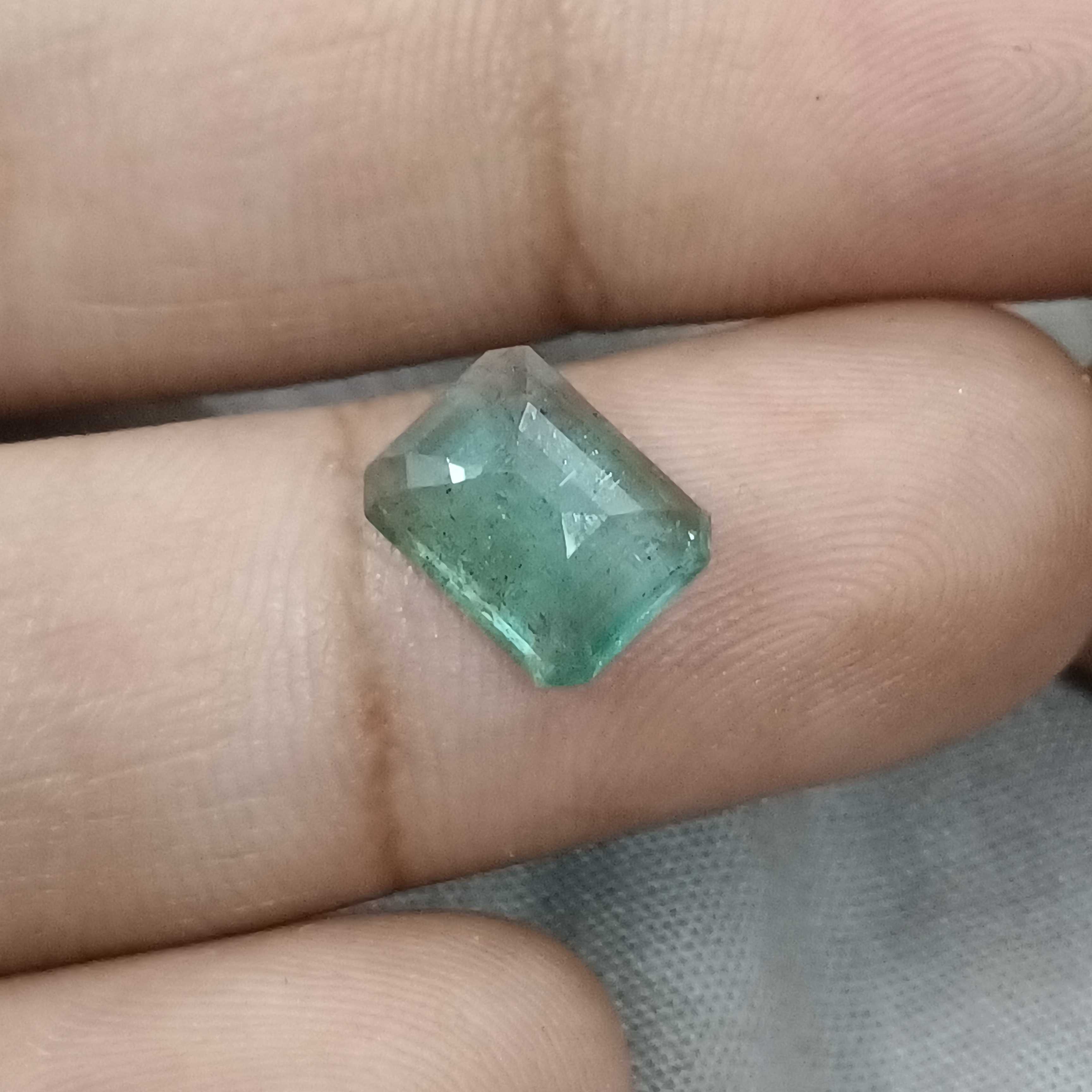 2.87ct GSI certified medium light metal green octagon cut emerald gemstone 