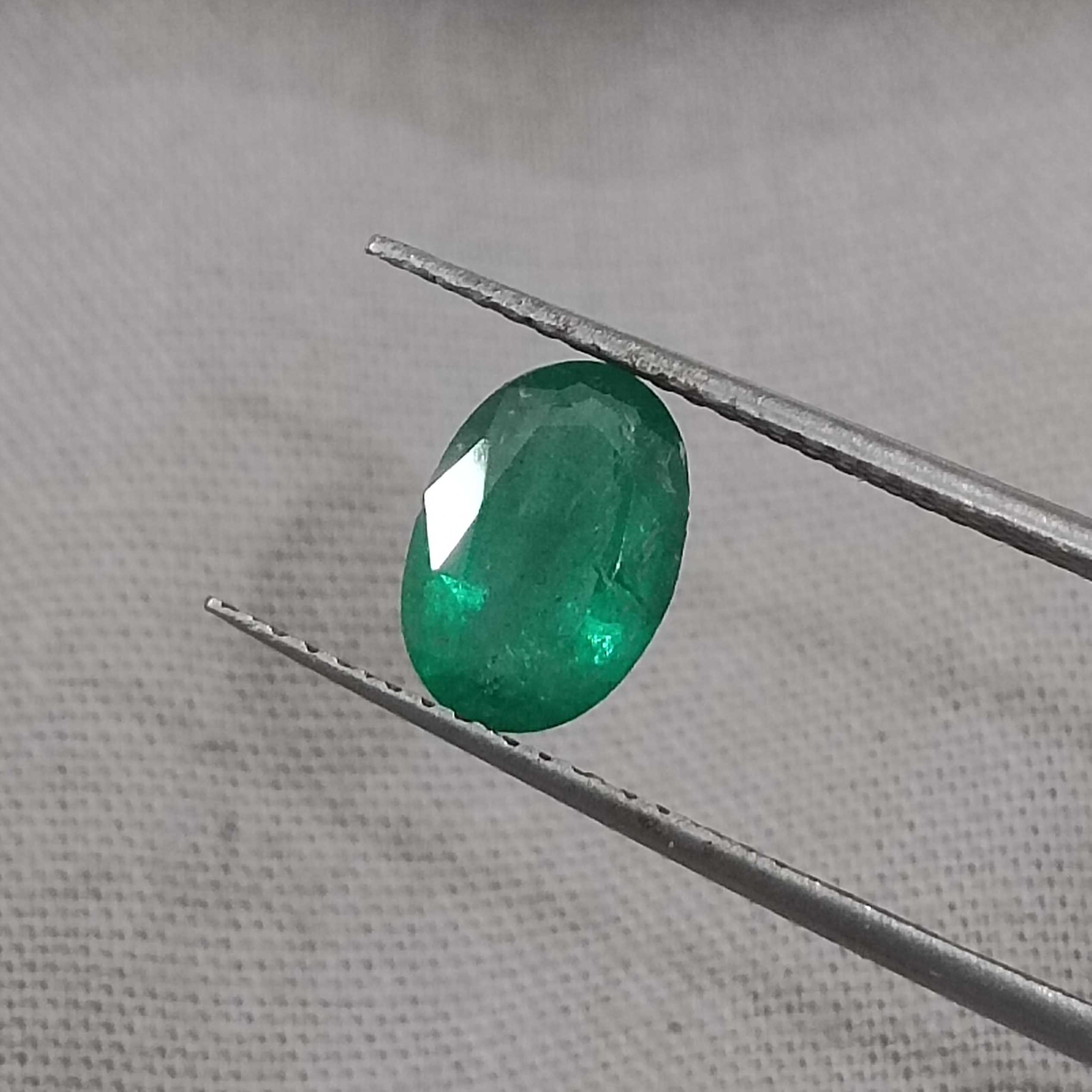 1.05cts GSI certified deep golden green oval cut Zambian emerald 