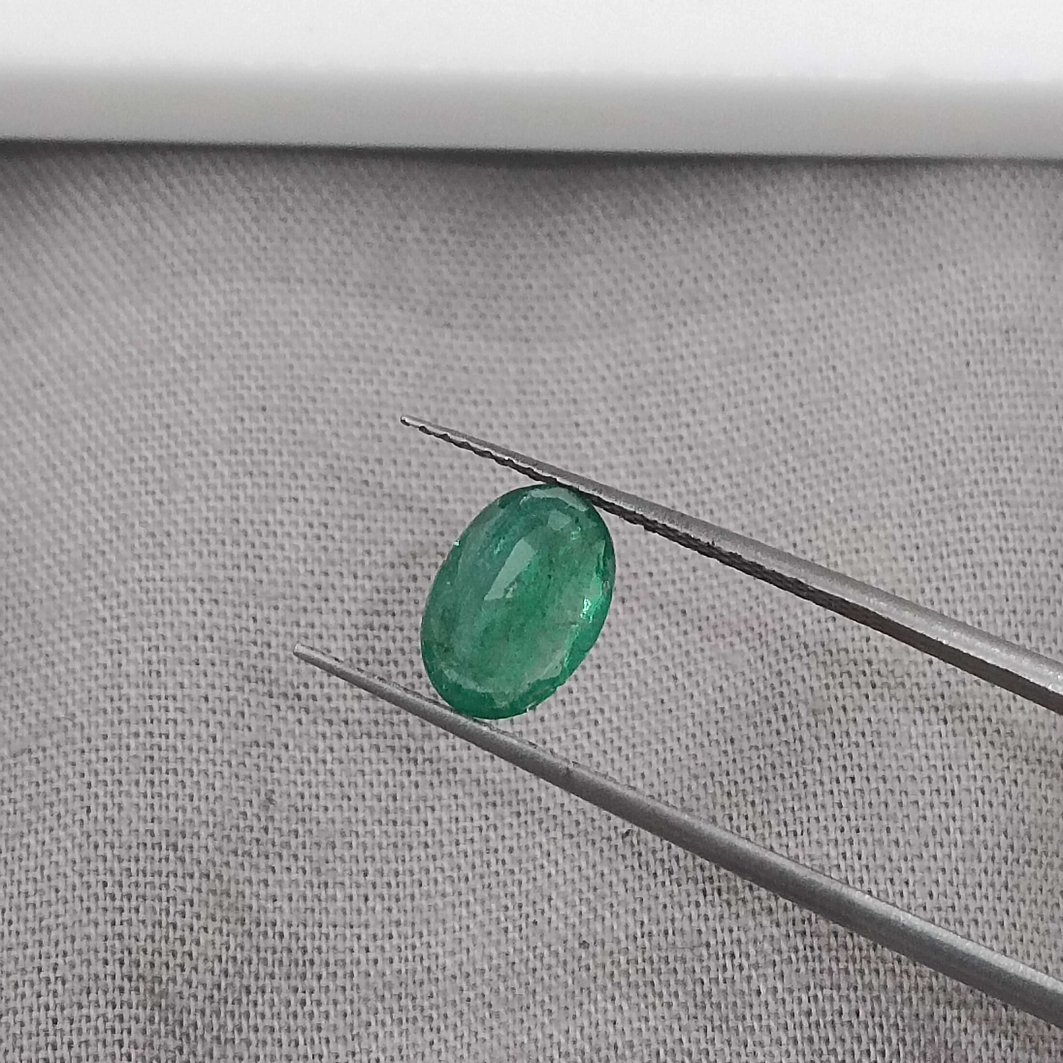 1.05cts GSI certified deep golden green oval cut Zambian emerald 