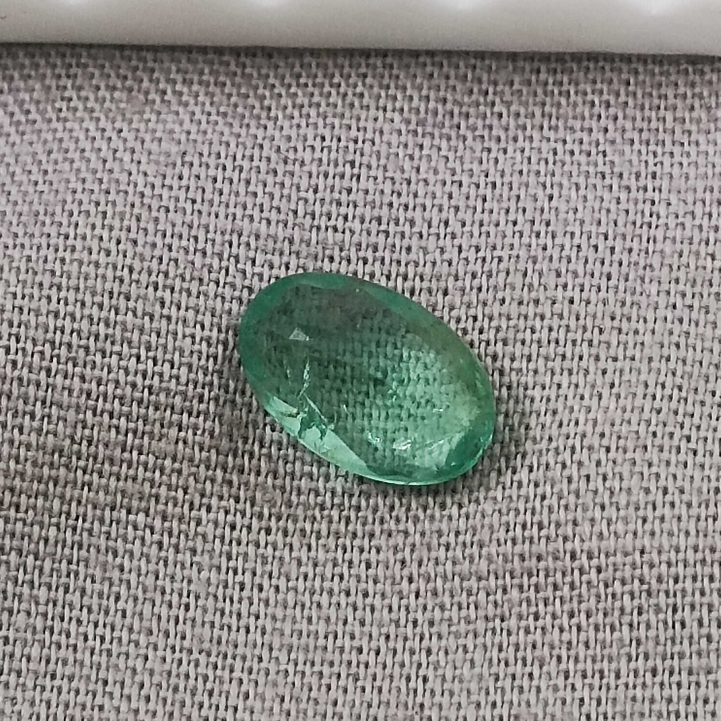 1.28cts certified sea foam green oval cut Zambian emerald gemstone 