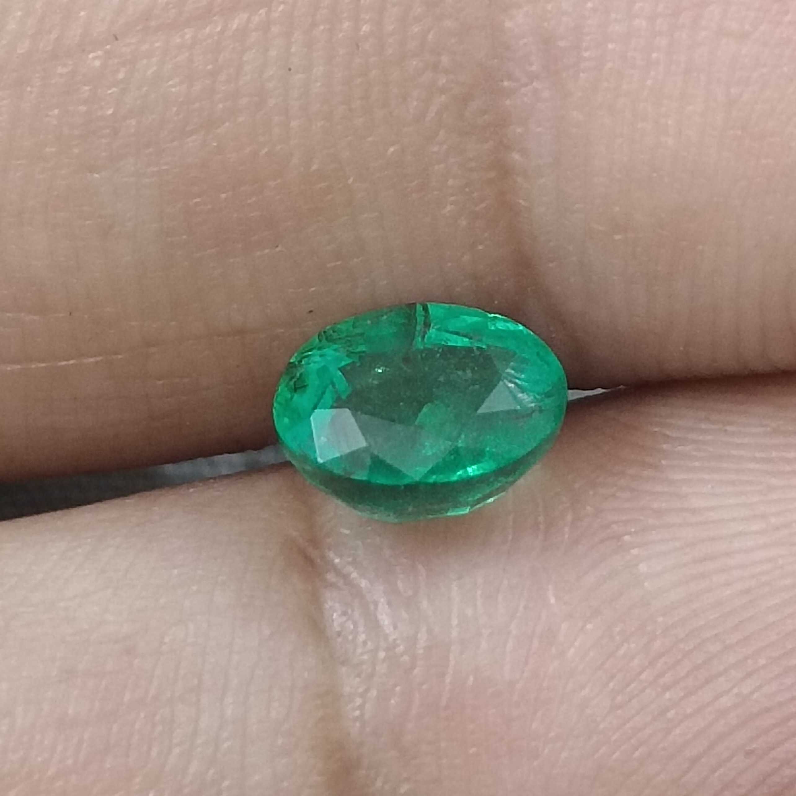 1.29cts GSI certified glass green oval cut emerald gemstone 