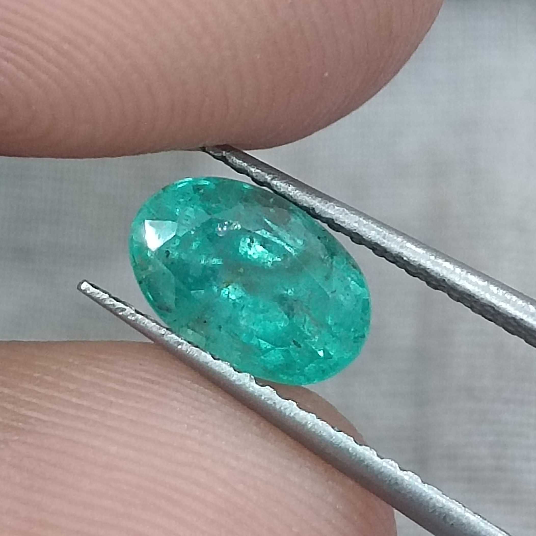 1.43cts GSI (USA) certified pastel green oval cut certified Russian emerald 