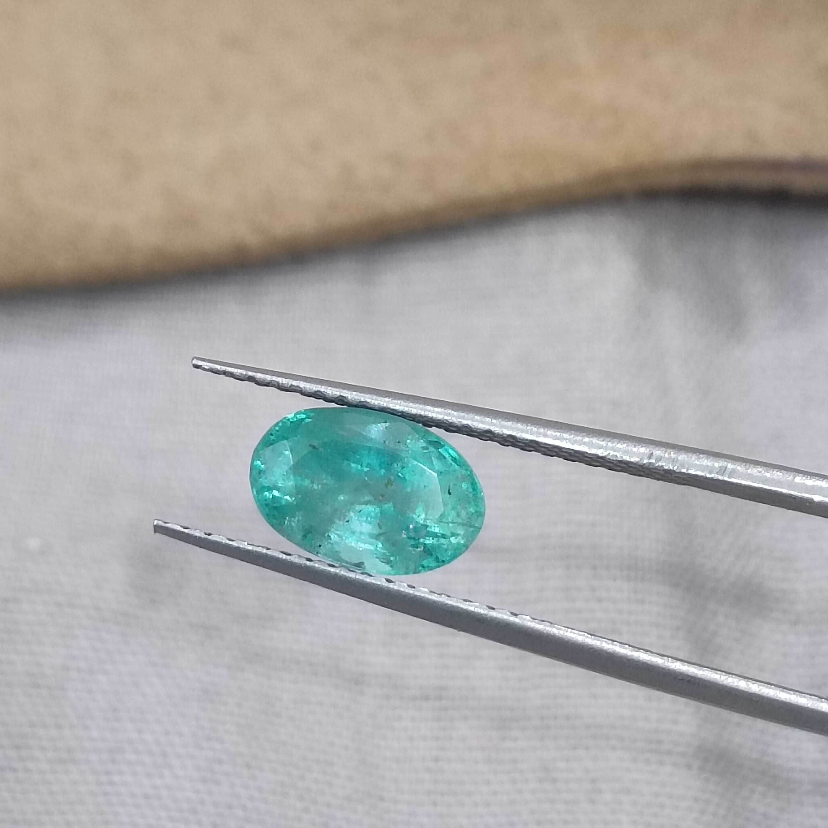 1.43cts GSI (USA) certified pastel green oval cut certified Russian emerald 