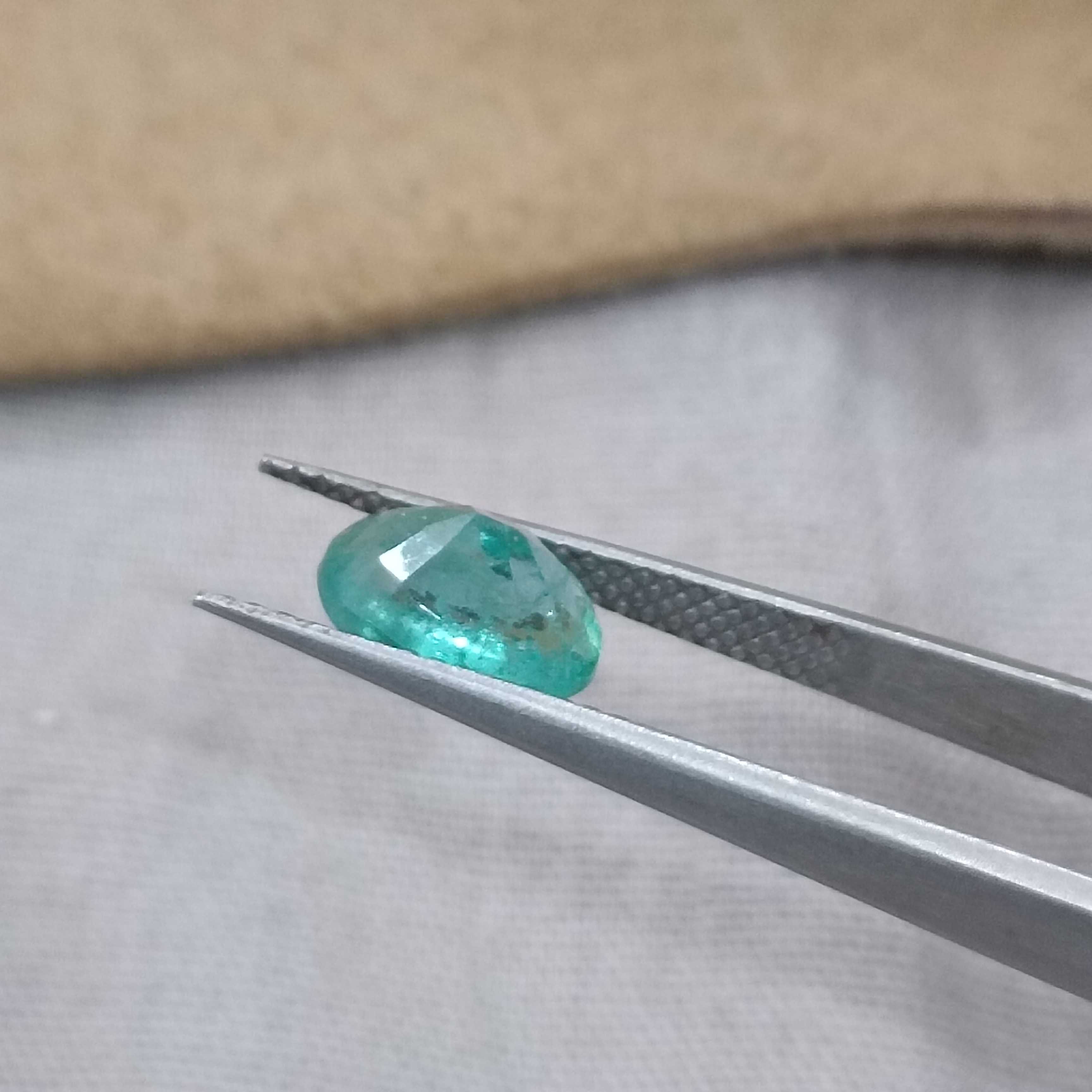 1.43cts GSI (USA) certified pastel green oval cut certified Russian emerald 