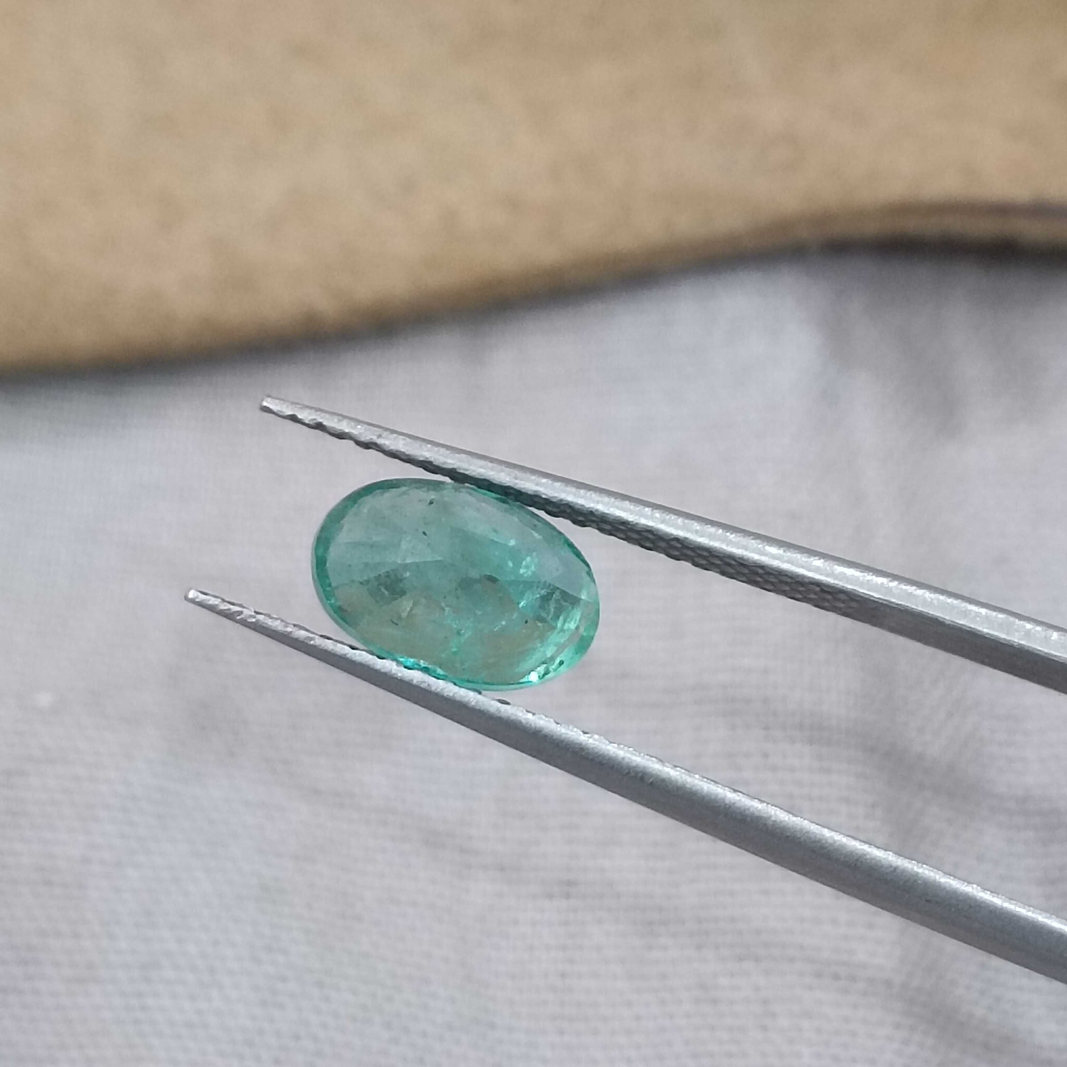1.43cts GSI (USA) certified pastel green oval cut certified Russian emerald 