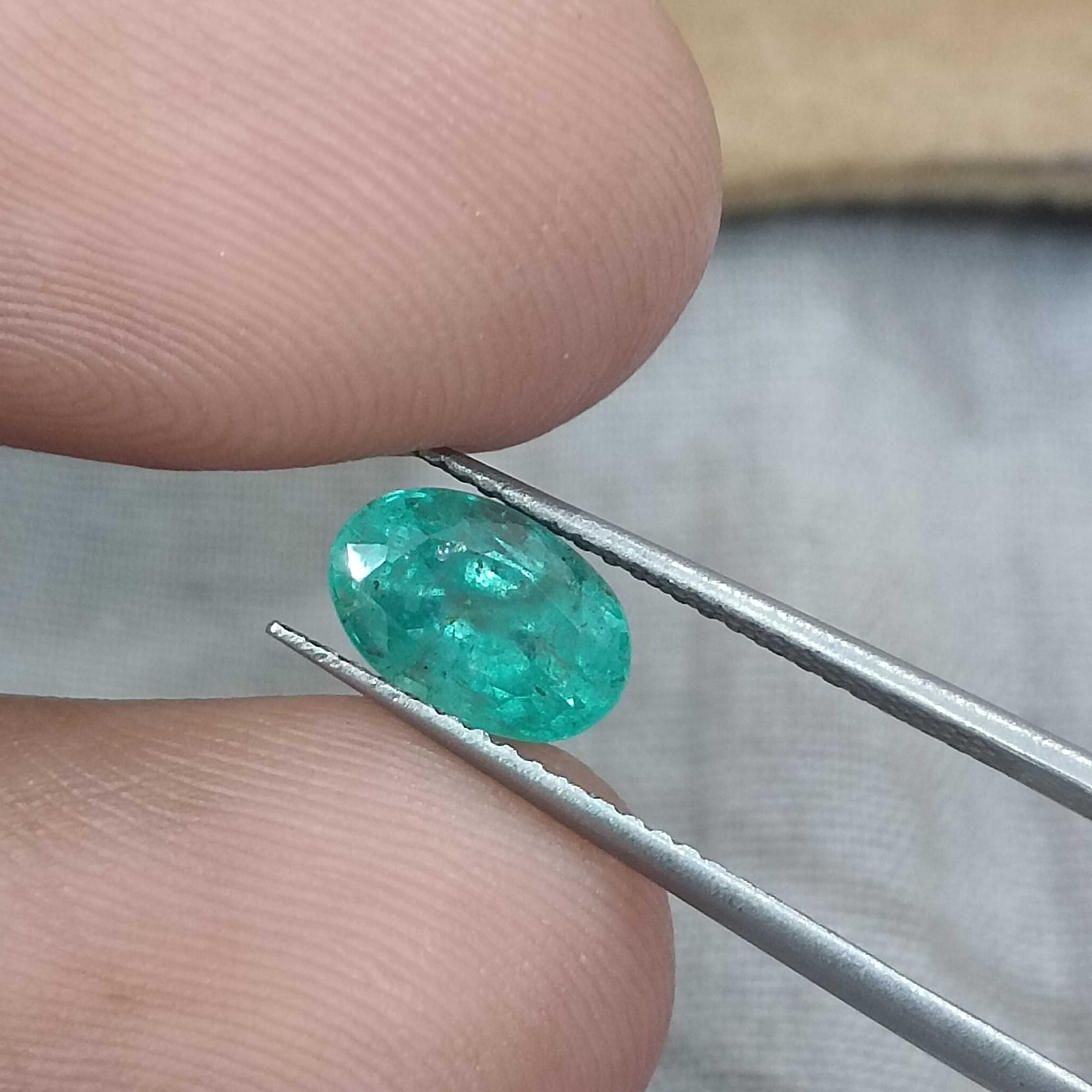 1.43cts GSI (USA) certified pastel green oval cut certified Russian emerald 