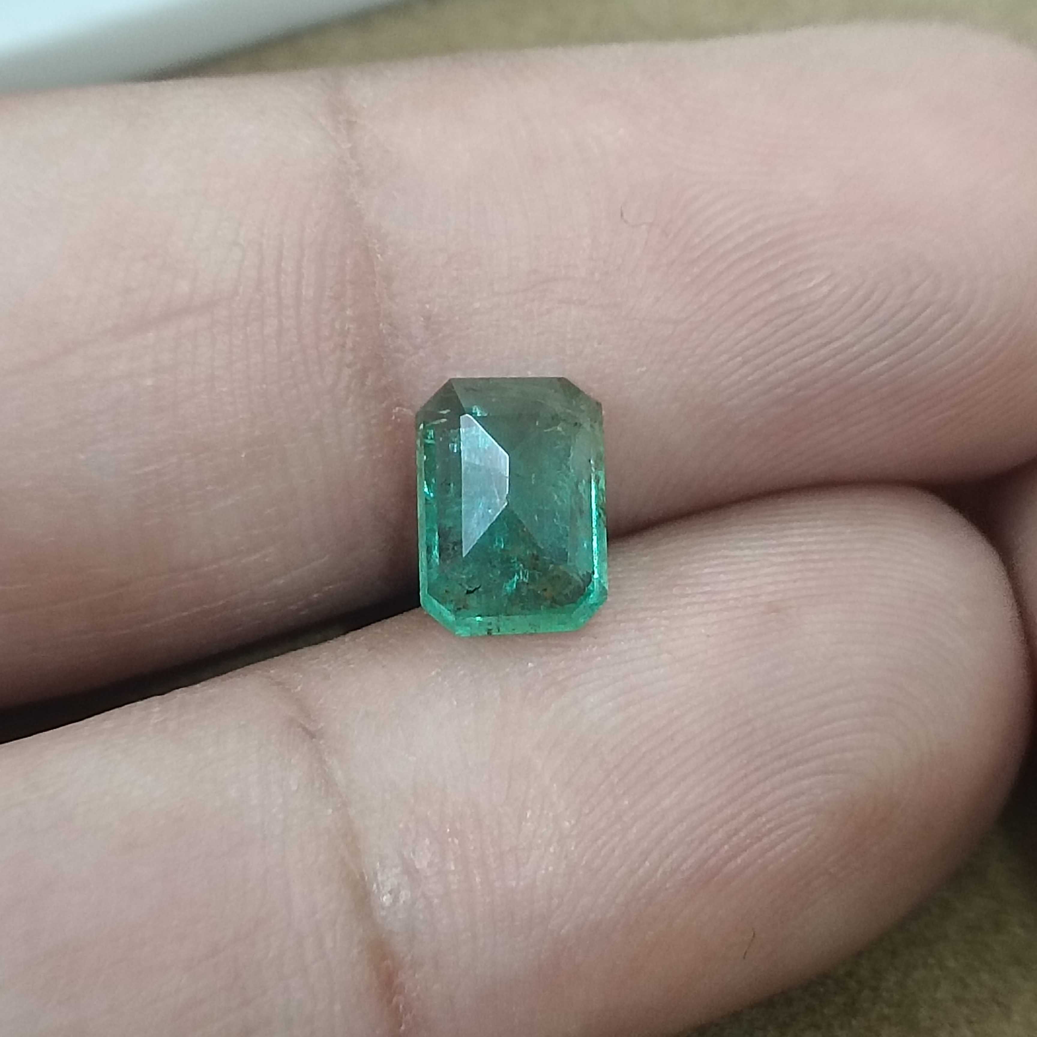 1.54cts GSI certified natural cool green octagon cut emerald gemstone 