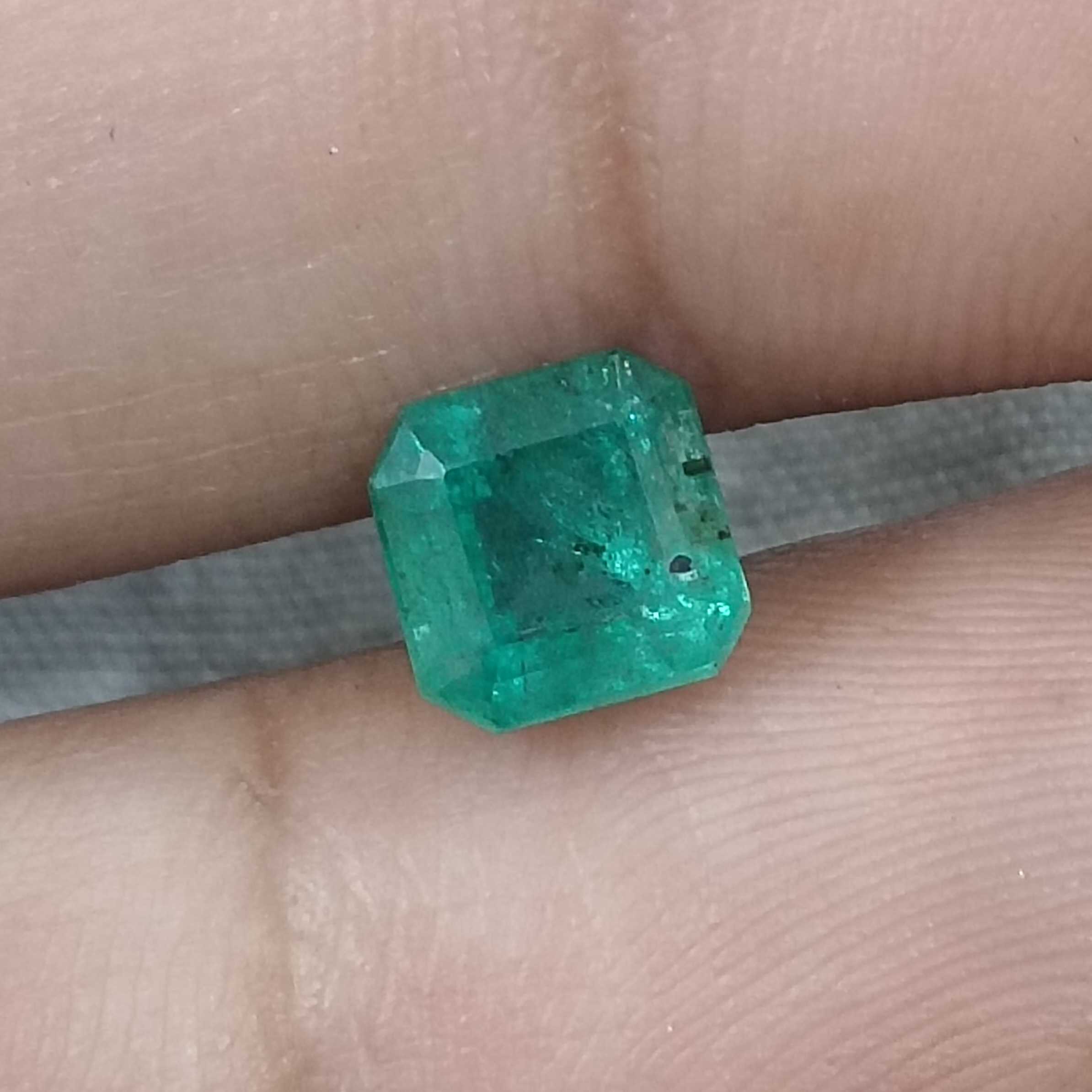 1.72cts certified bluish medium green octagon cut natural emerald