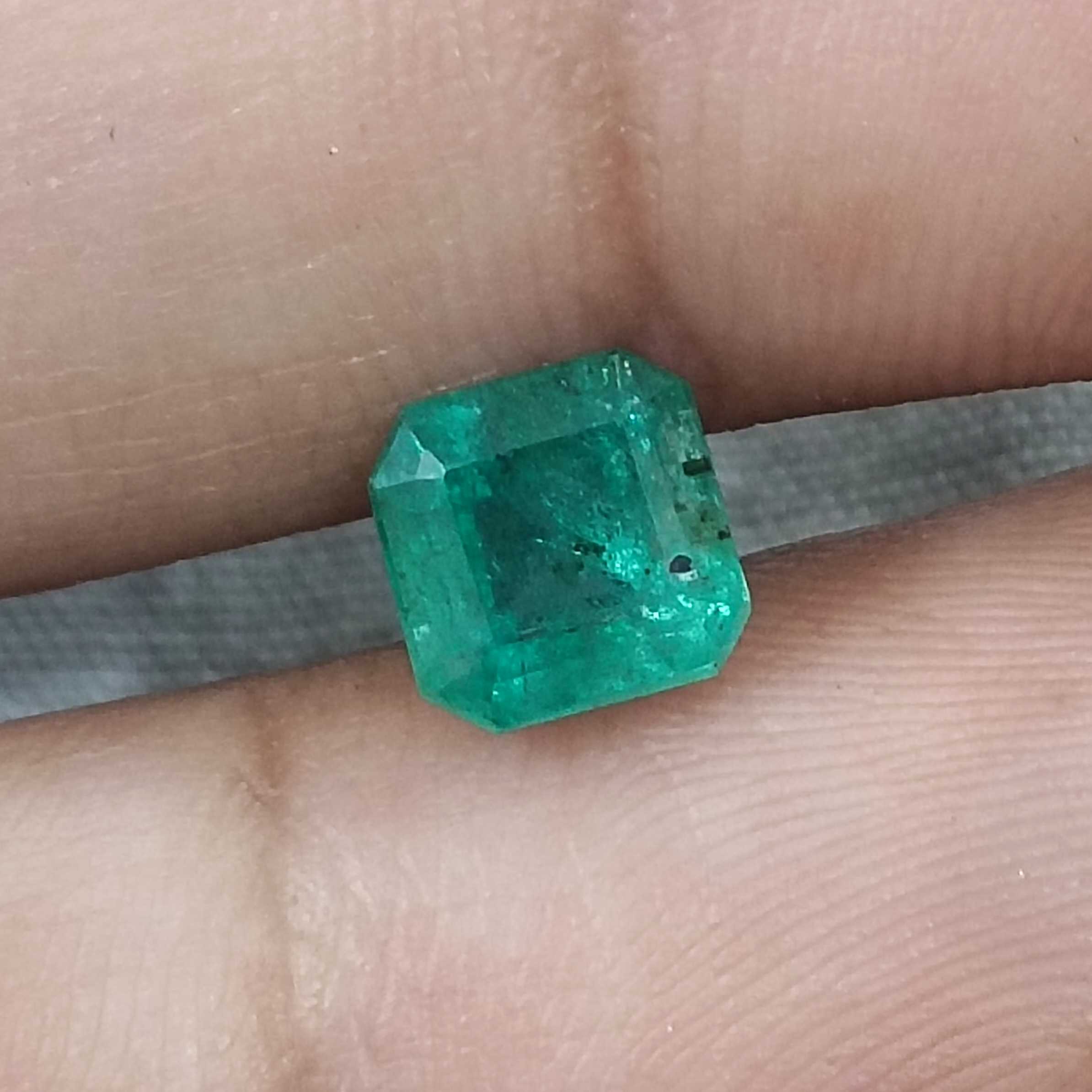 1.72cts certified bluish medium green octagon cut natural emerald