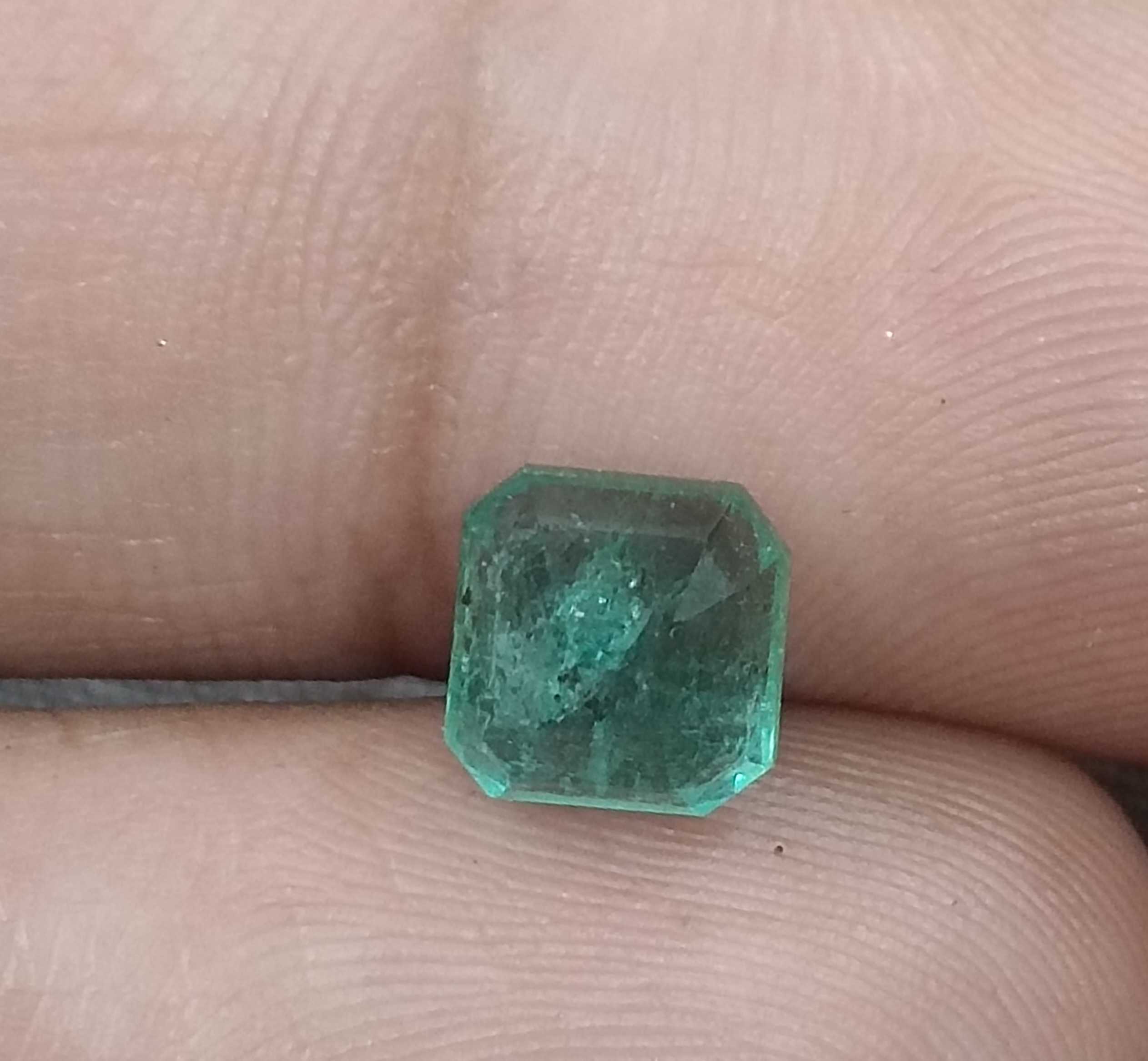 1.72cts certified bluish medium green octagon cut natural emerald
