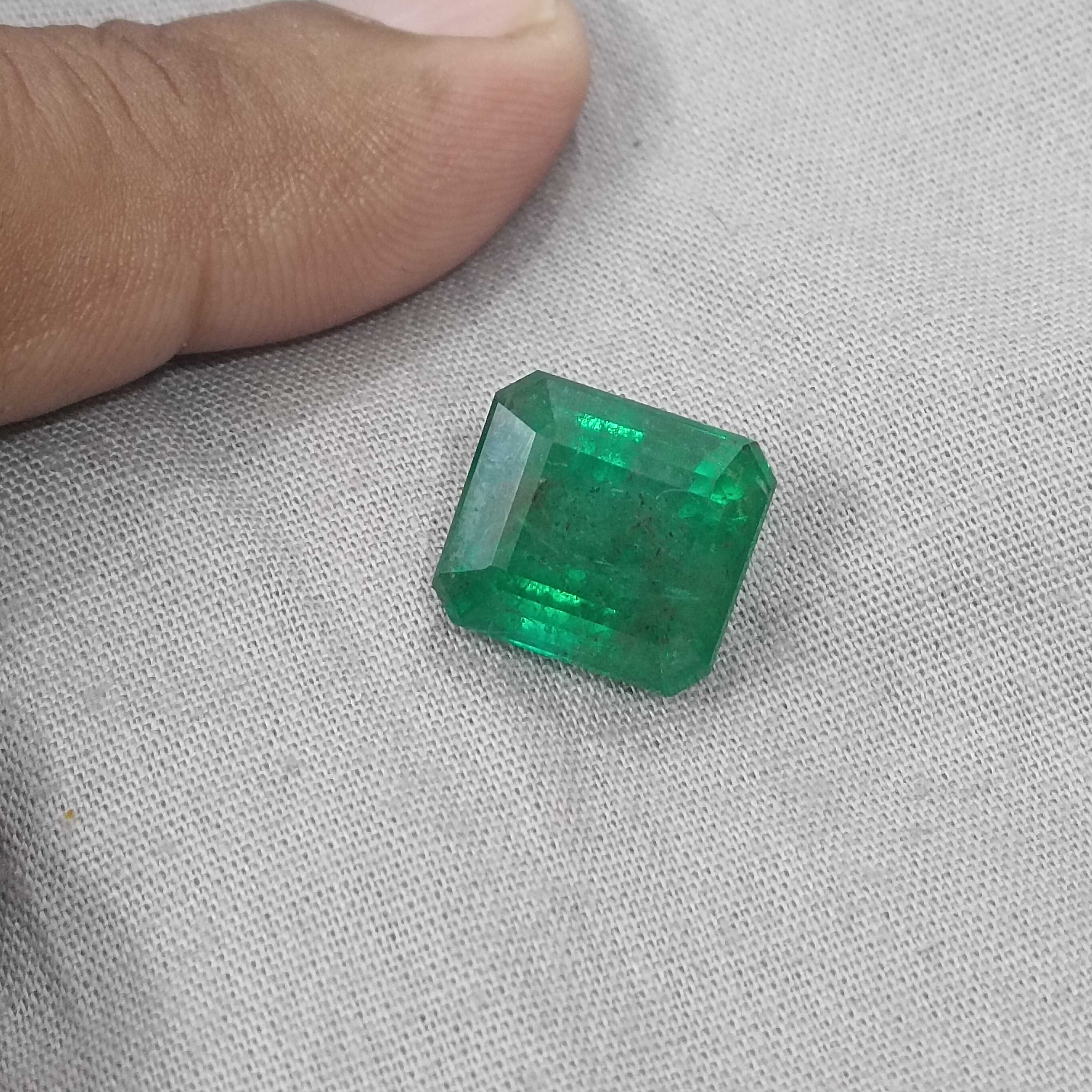 10.58cts certified natural vivid green octagon cut Panjshir emerald gemstone 