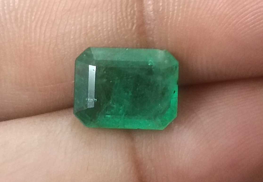 3.94ct GSI certified medium green emerald cut Zambian emerald 