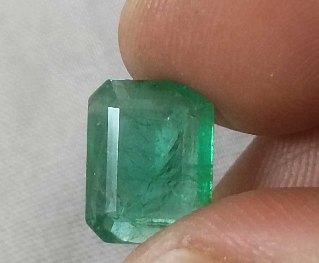 3.94ct GSI certified medium green emerald cut Zambian emerald 