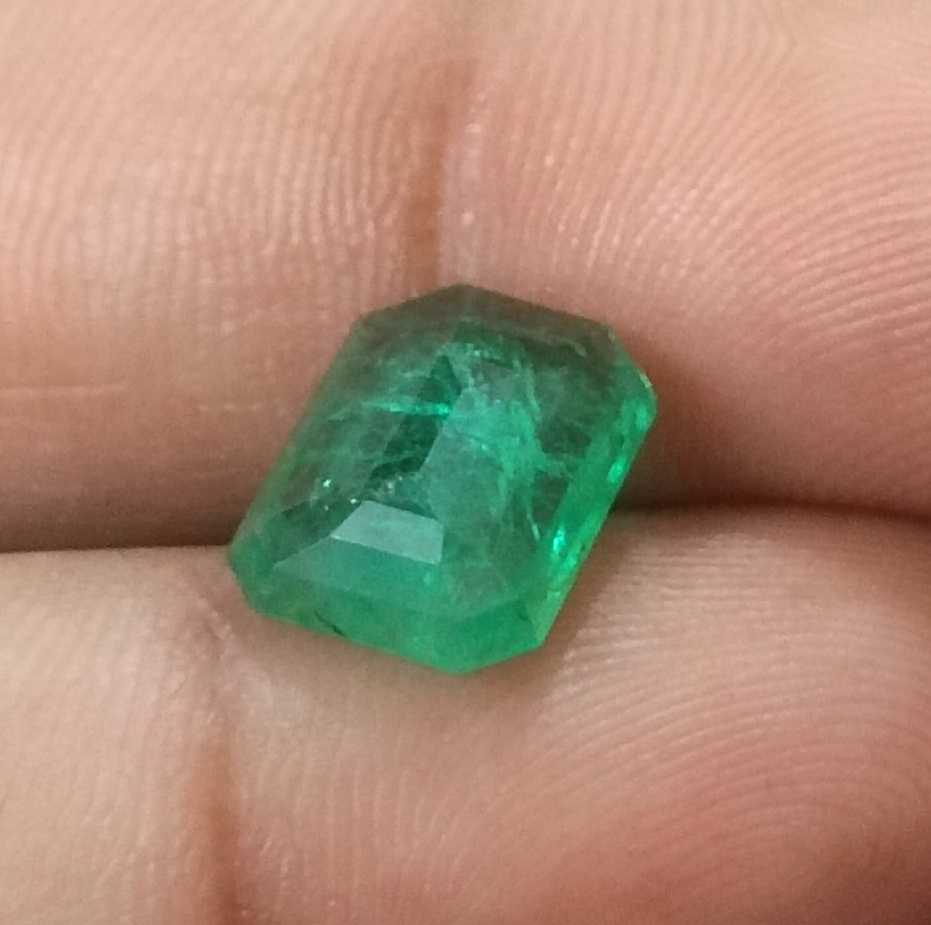 3.94ct GSI certified medium green emerald cut Zambian emerald 
