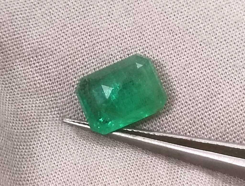 3.94ct GSI certified medium green emerald cut Zambian emerald 