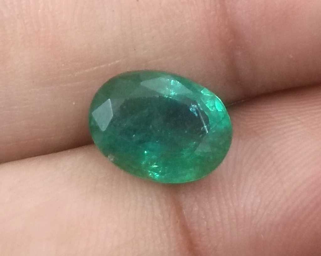 3.82ct GSI certified medium green emerald cut Zambian emerald 