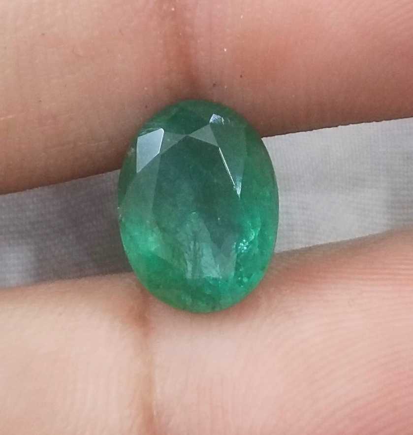 3.82ct GSI certified medium green emerald cut Zambian emerald 