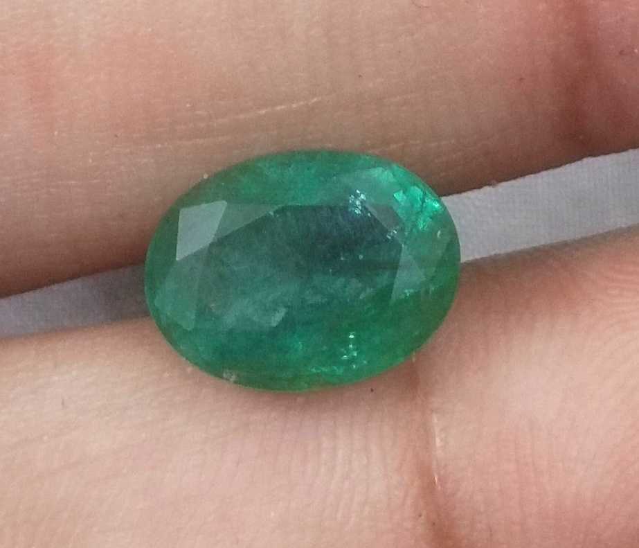 3.82ct GSI certified medium green emerald cut Zambian emerald 