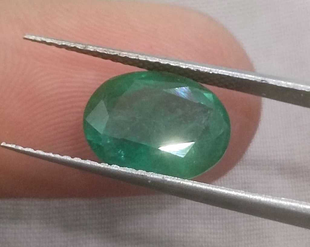 3.82ct GSI certified medium green emerald cut Zambian emerald 