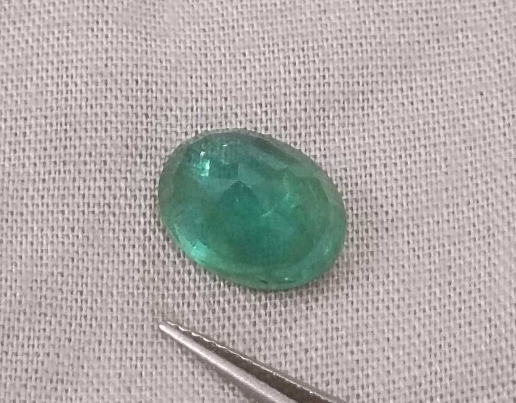 3.82ct GSI certified medium green emerald cut Zambian emerald 