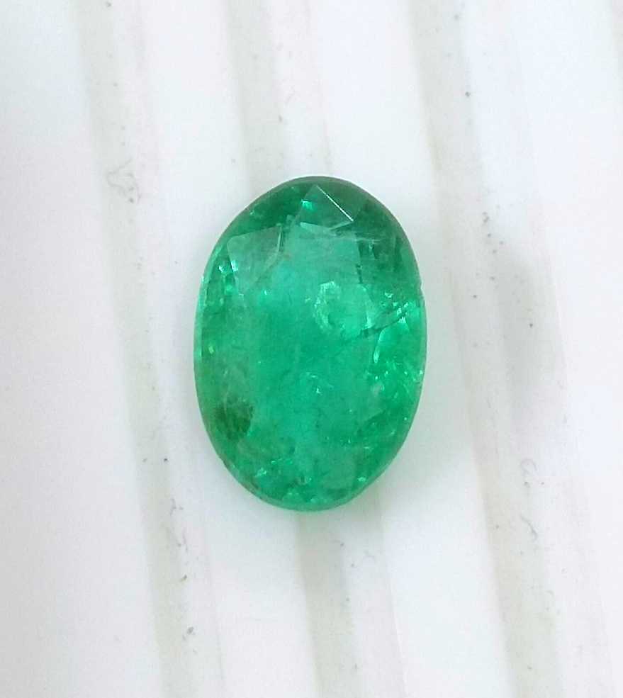 2.57ct GSI certified neon green oval cut Zambian emerald 