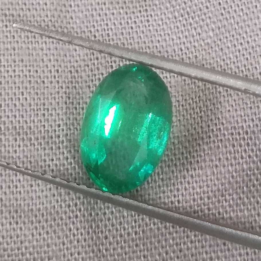 1.96ct GSI certified deep golden green Swat emerald oval cut/