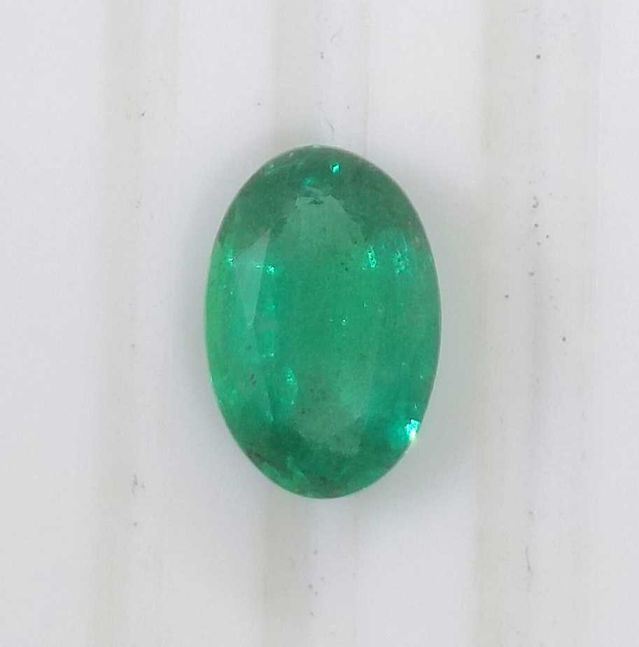 1.96ct GSI certified deep golden green Swat emerald oval cut