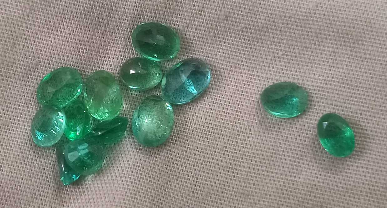 8.40ct clean shiny medium light to vivid green oval cut Zambian emerald parcel