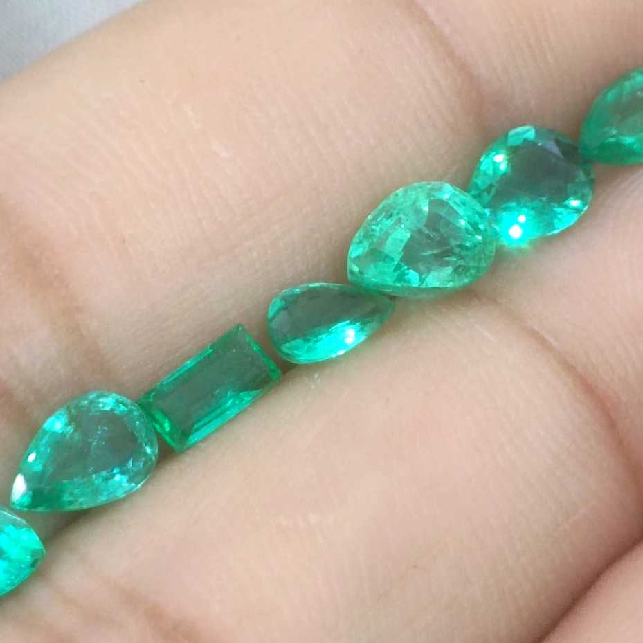 4.10ct medium to medium deep clean electric green loose Zambian emeralds/