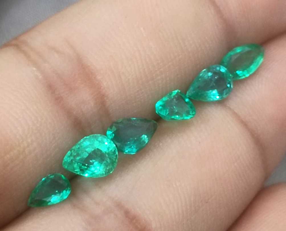 4.10ct medium to medium deep clean electric green loose Zambian emeralds