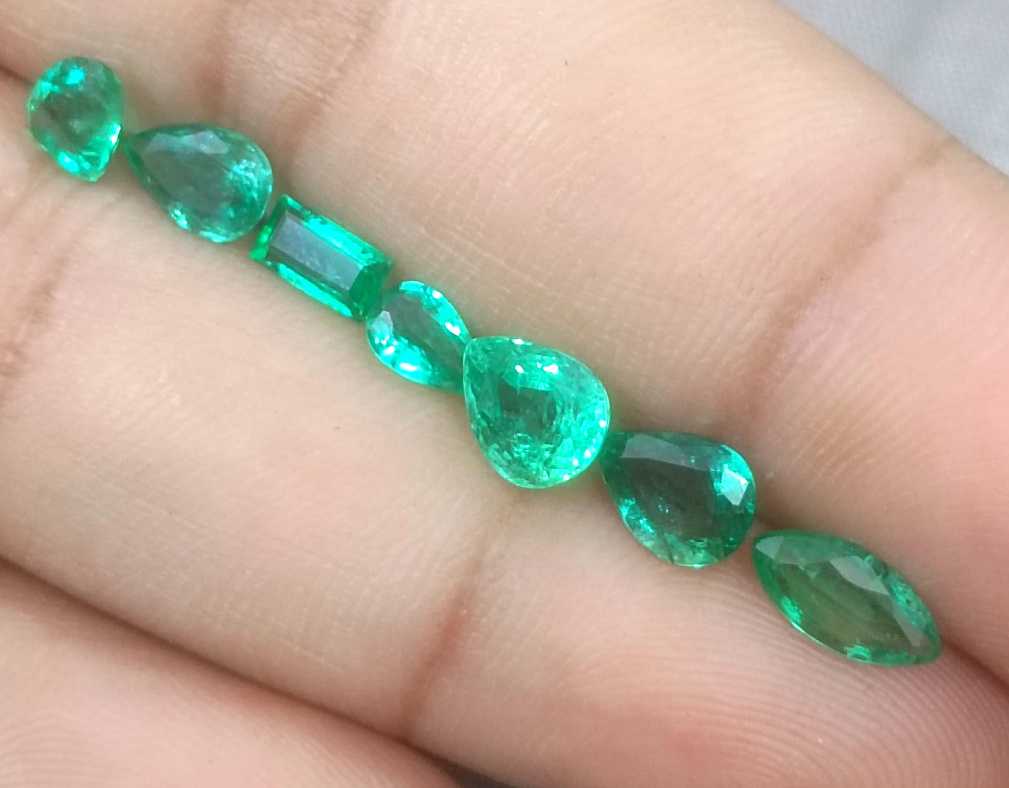 4.10ct medium to medium deep clean electric green loose Zambian emeralds
