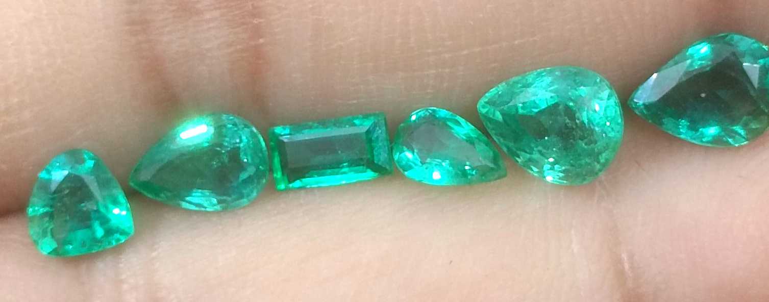 4.10ct medium to medium deep clean electric green loose Zambian emeralds