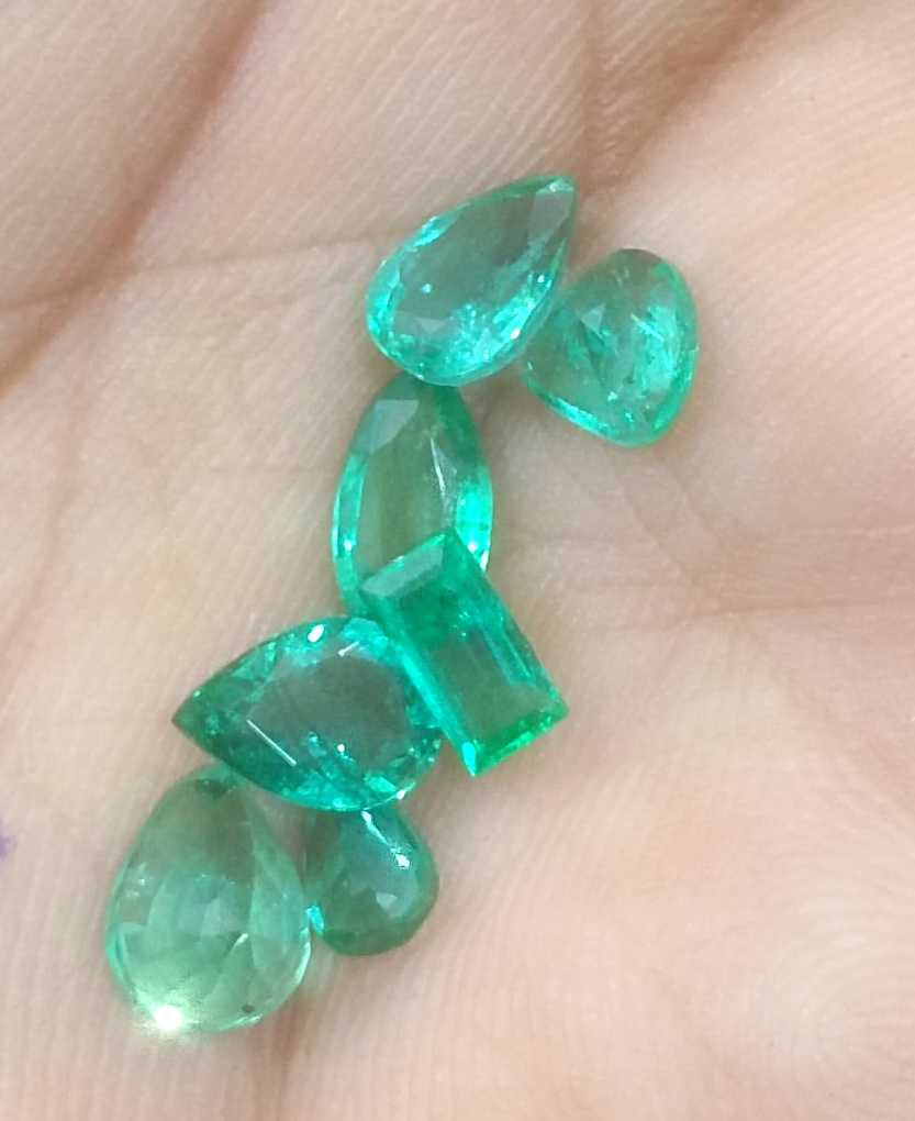 4.10ct medium to medium deep clean electric green loose Zambian emeralds