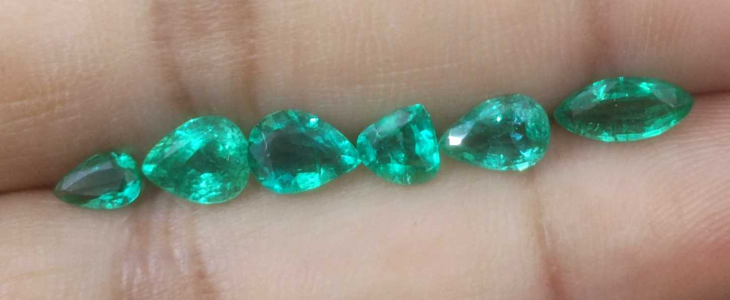 4.10ct medium to medium deep clean electric green loose Zambian emeralds