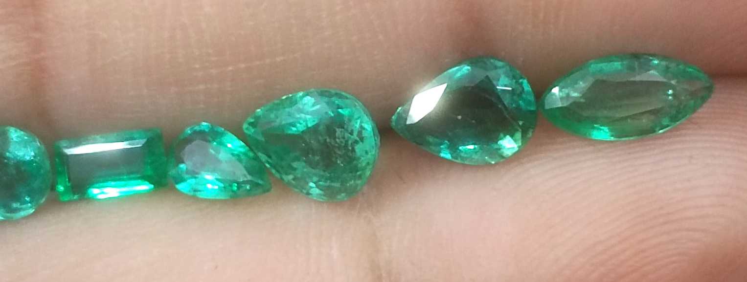4.10ct medium to medium deep clean electric green loose Zambian emeralds