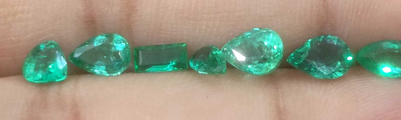 4.10ct medium to medium deep clean electric green loose Zambian emeralds