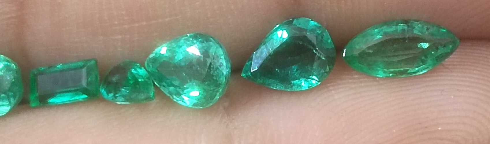 4.10ct medium to medium deep clean electric green loose Zambian emeralds