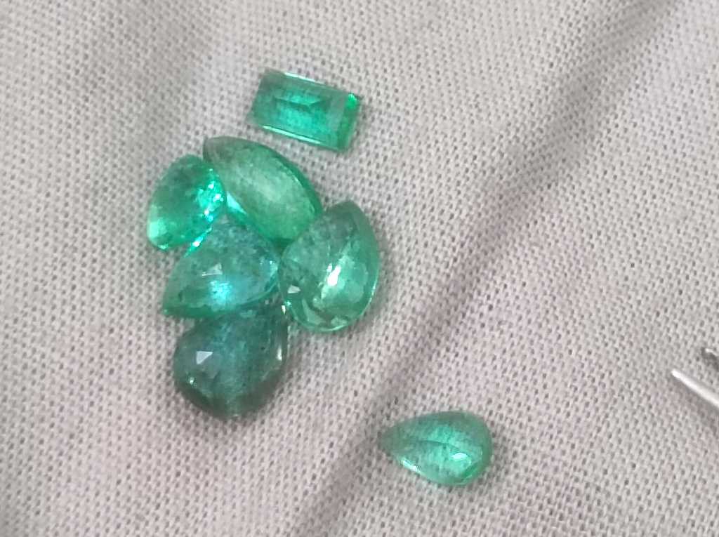 4.10ct medium to medium deep clean electric green loose Zambian emeralds