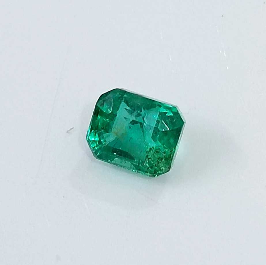1.29cts GSI USA certified medium deep green Zambian emerald octagon cut stone