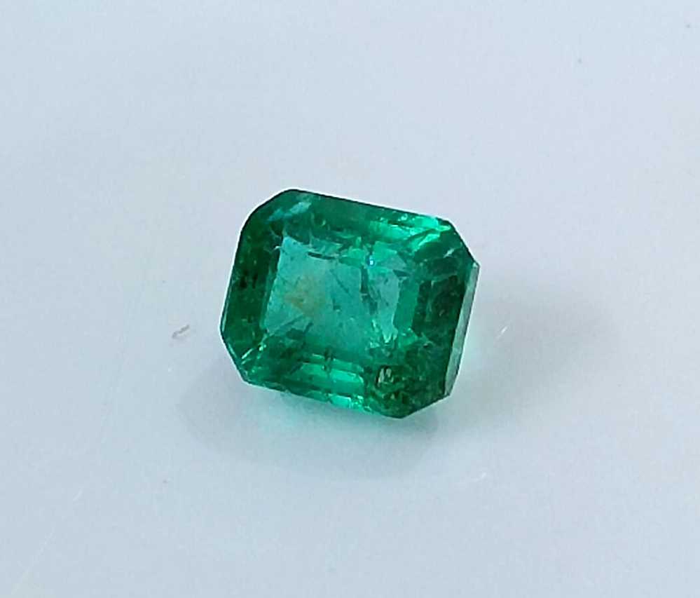 1.29cts GSI USA certified medium deep green Zambian emerald octagon cut stone