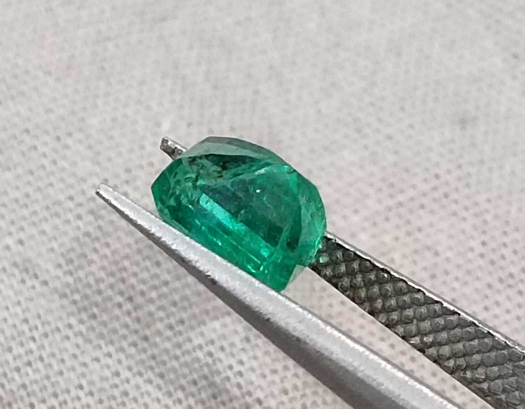 1.29cts GSI USA certified medium deep green Zambian emerald octagon cut stone