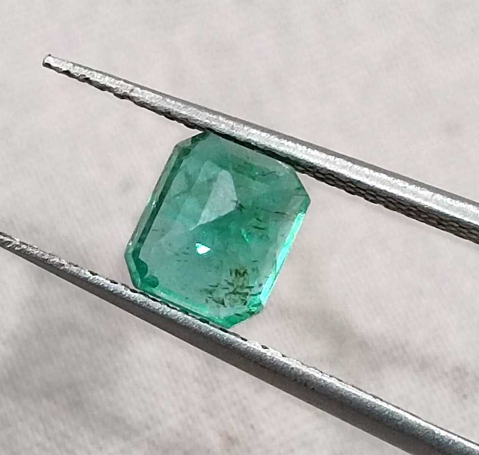 1.29cts GSI USA certified medium deep green Zambian emerald octagon cut stone