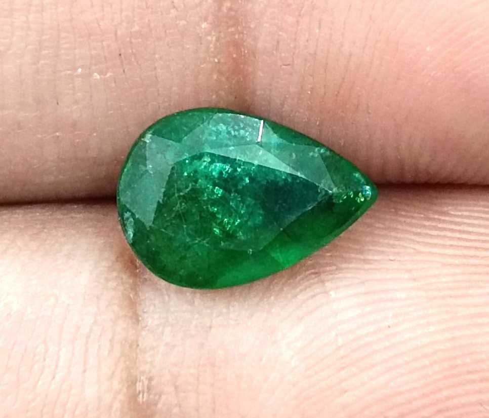 GSI certified 2.31ct deep green Zambian emerald pear cut stone