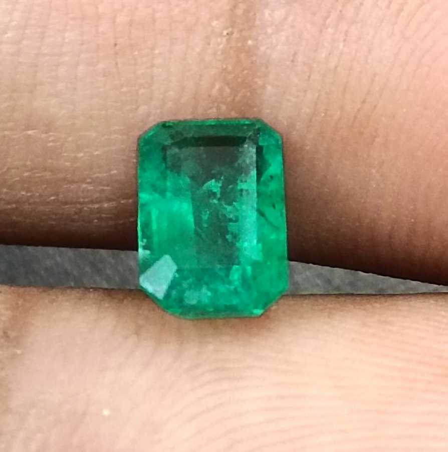 GSI certified 1.35ct deep golden green Panjshir emerald octagon cut gemstone