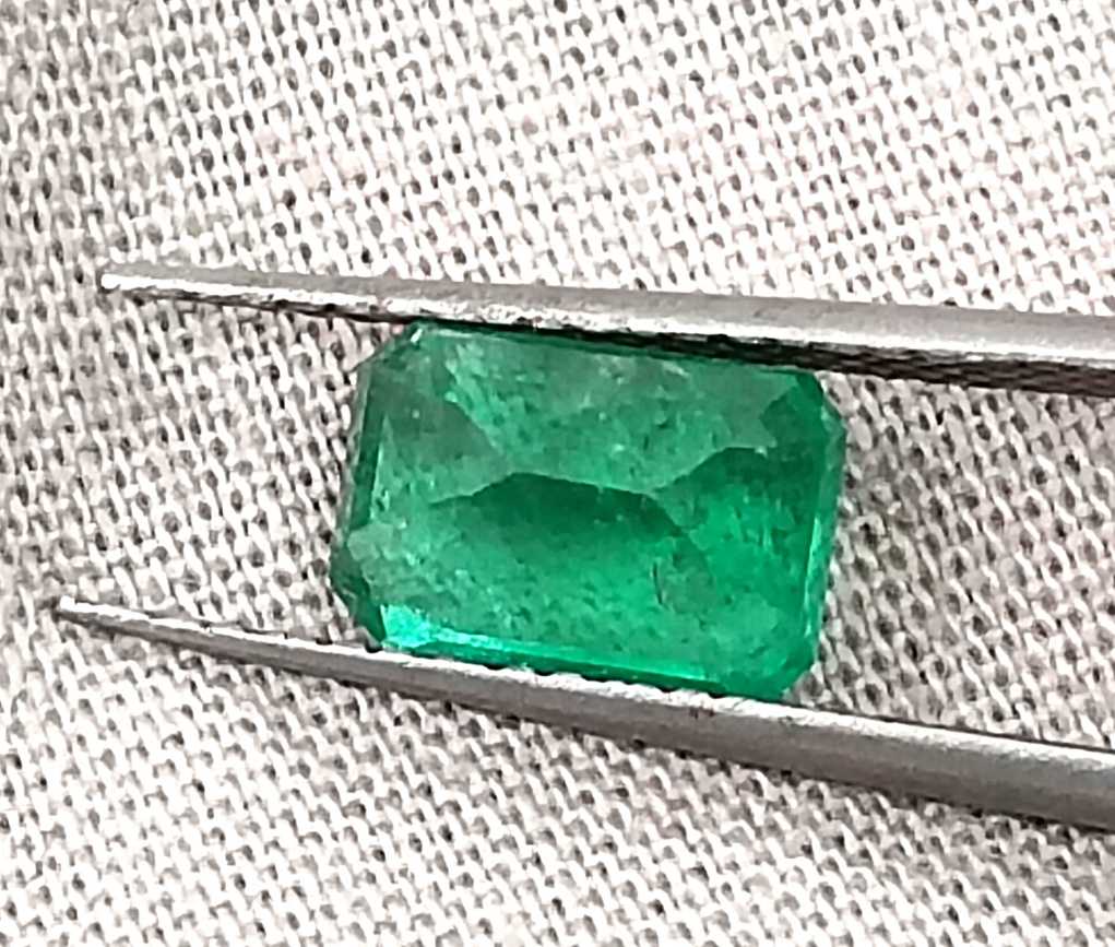 GSI certified 1.35ct deep golden green Panjshir emerald octagon cut gemstone
