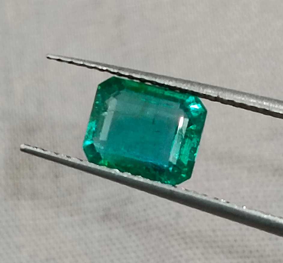 1.57cts GSI USA certified natural medium deep green emerald cut Zambian emerald 