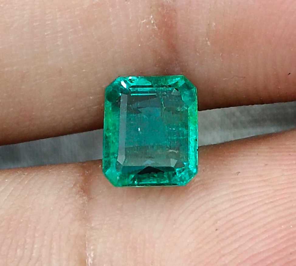 1.57cts GSI USA certified natural medium deep green emerald cut Zambian emerald 