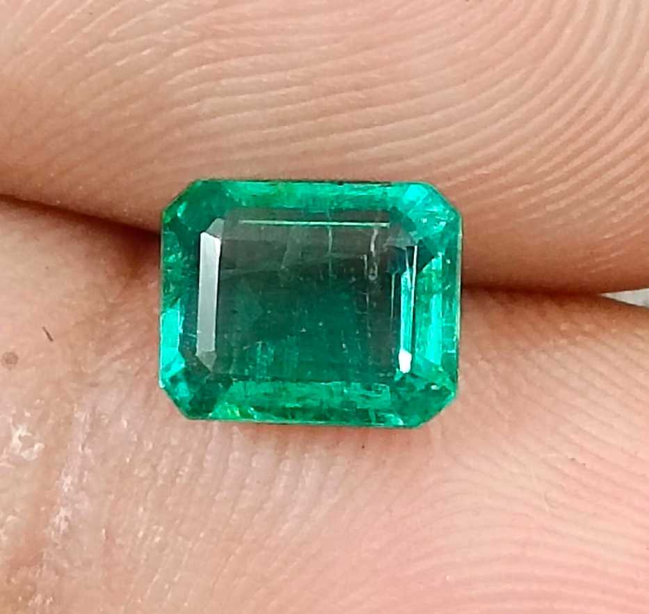 1.57cts GSI USA certified natural medium deep green emerald cut Zambian emerald 