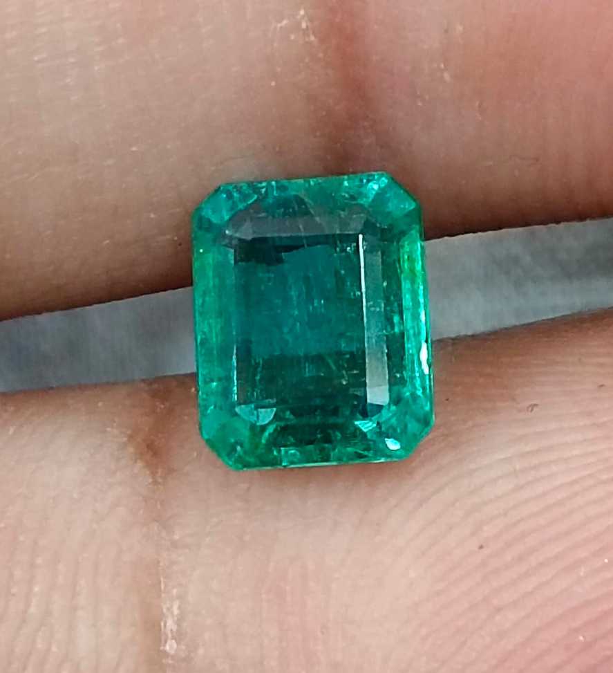 1.57cts GSI USA certified natural medium deep green emerald cut Zambian emerald 