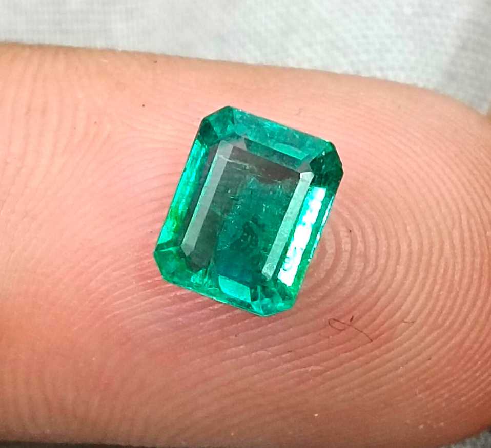 1.57cts GSI USA certified natural medium deep green emerald cut Zambian emerald 